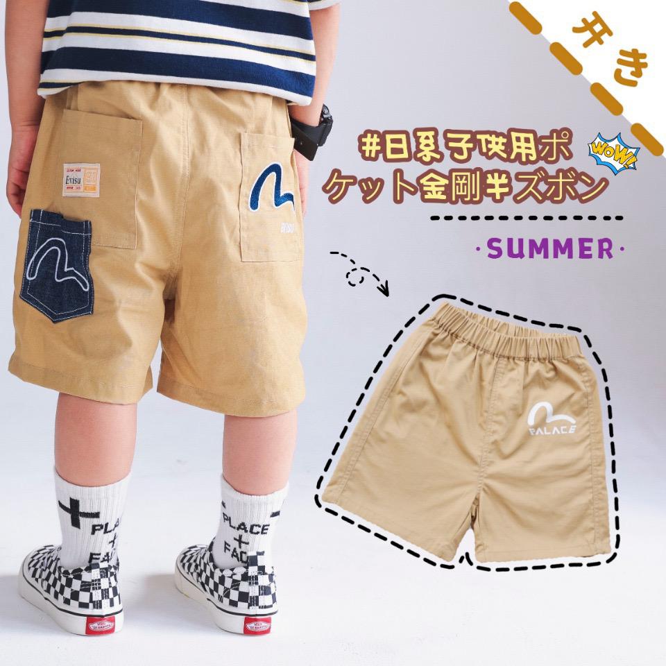 $98/1。2件起$9O/1。Evisu牛仔接拼梭织短裤