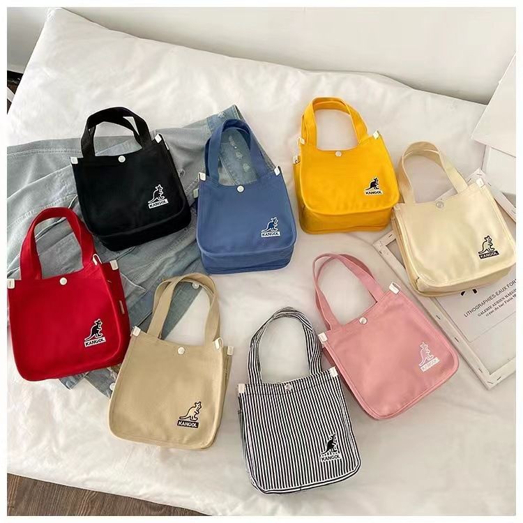 $88/1。2件起$78/1。Kangol 斜挎手提小方包