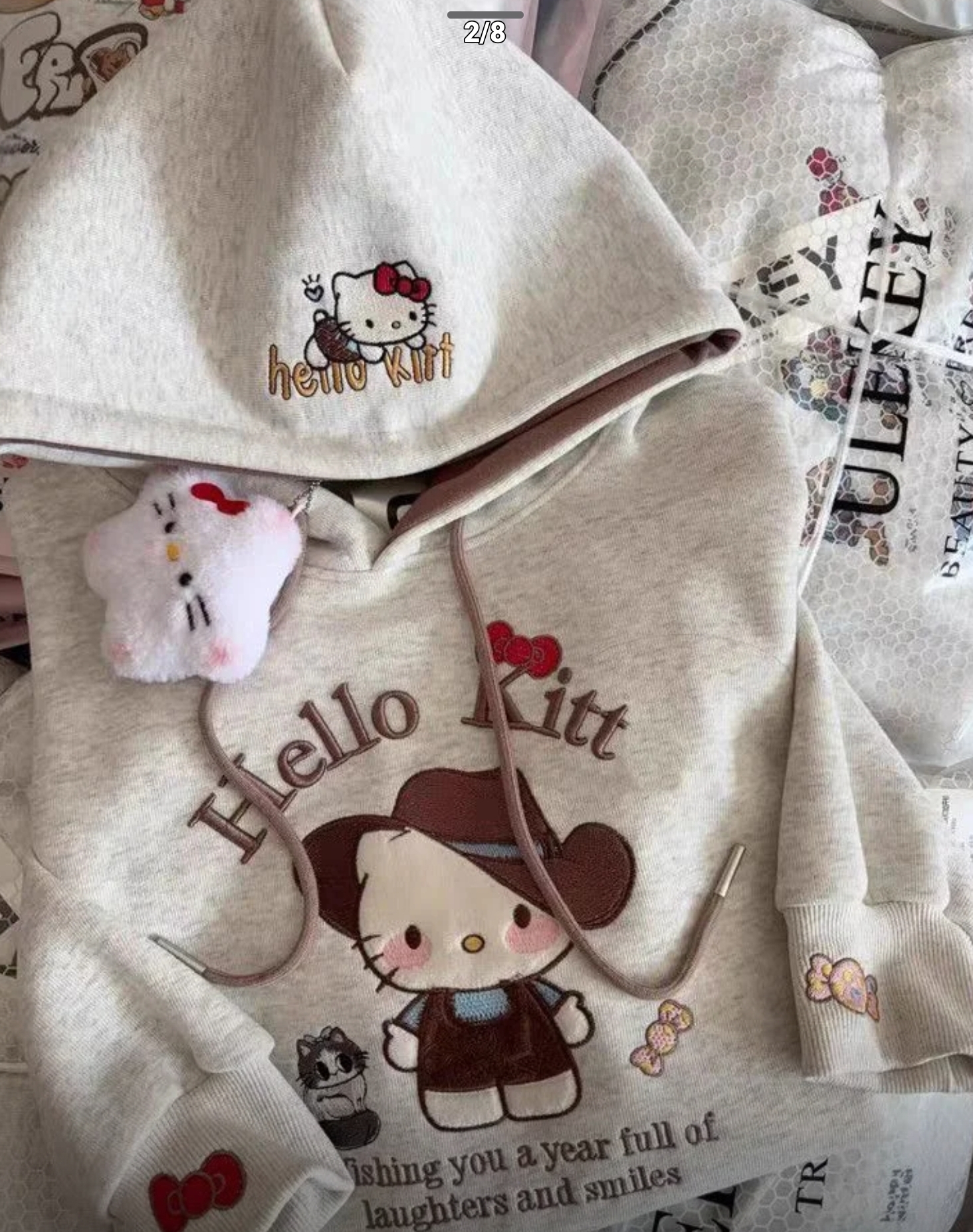 $68件。2件起$60件。🤎🐱Hello Kitty 牛仔風帽T